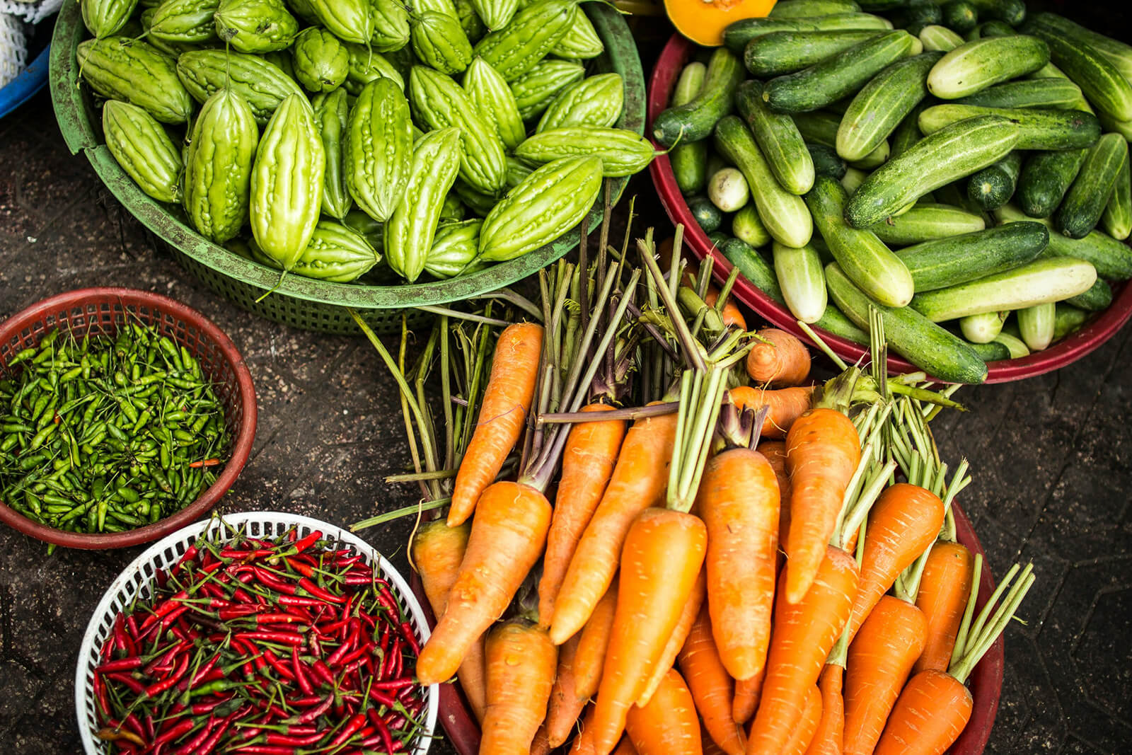 different assorted vegetables in buckets