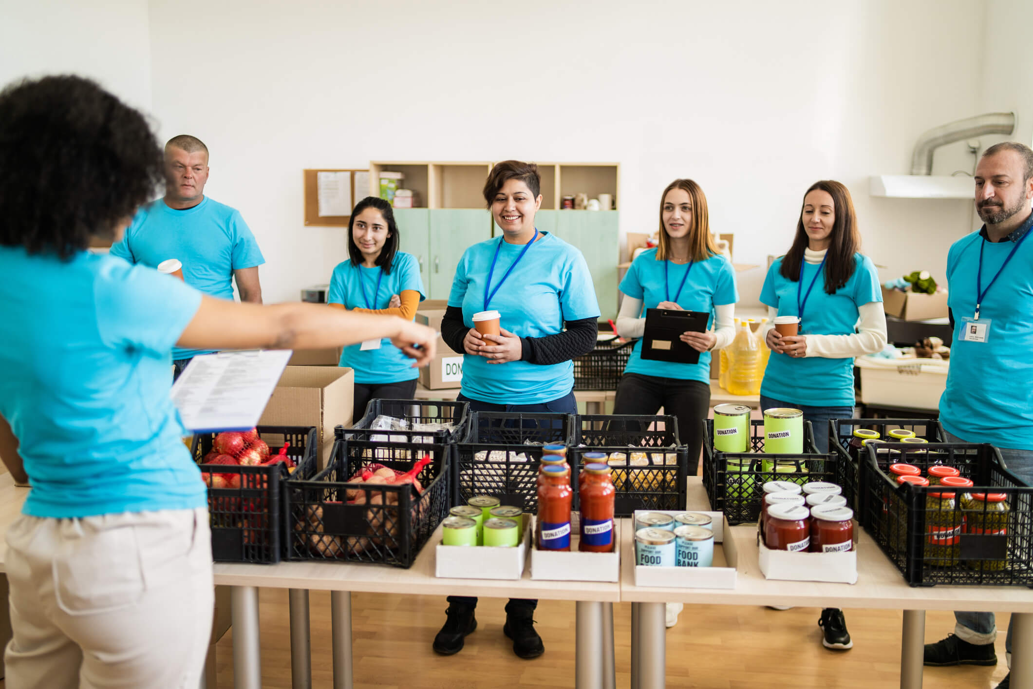 volunteers preparation to start sorting and organizing food donations in baskets